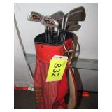 Nine Wilson Staff Golf Clubs with Bag