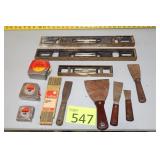 Three Levels, Tape Measures, Five Putty Knives