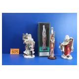 Santa Through The Years Statues