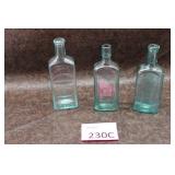 Three Vintage Glass Bottles