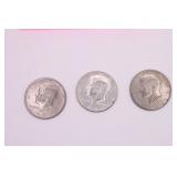 Three Kennedy Half Dollar Coins