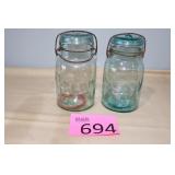 Two Atlas EZ Seal Blue Jars with Lids