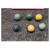 Six Clay "Commies" Marbles
