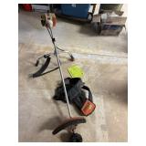 Stihl gas powered weedeater with harness