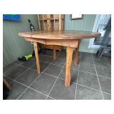 Round Wooden Dining Table with Leaves