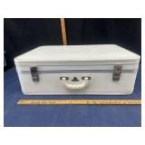 Large white suitcase