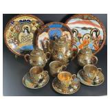 Three hand painted Japanese Satsuma plates, two