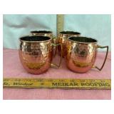 Four Hammered Copper Mugs