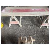 Two Saw Horses With Barn Board