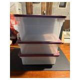 Three Rubbermaid Storage Bins