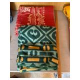 Two Folded Patterned Blankets