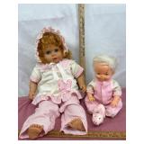 Two Vintage Dolls in Pink Outfits