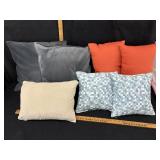 Box of assorted decorative pillows