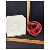 This red and orange Luxury Lane infinity knot