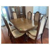 Wooden table with leaf and six chairs