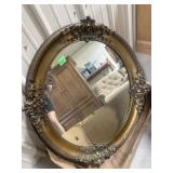 Heavy oval mirror