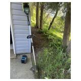 Yardwork trimmer with batteries and charger