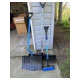 Two snow shovels, and Snowbrush
