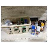 Laundry basket full of miscellaneous cleaning