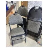 Set of 4 folding chairs featuring padded seats
