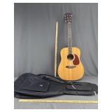 Accoustic guitar in bag