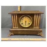 vintage Seth Thomas mantel clock featuring a