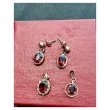 Vintage 10 karat gold and garnet earrings, one
