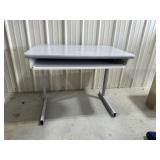 Computer desk with pullout tray