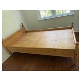 Wood bed frame with foam mattress and mattress