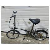 gray Dahon ï¿½yeahï¿½ folding bicycle features a rear