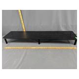 black monitor riser is a vented metal desktop