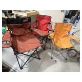 Three folding lawn chairs