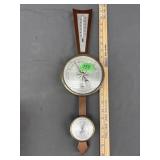 vintage Fisher aneroid barometer featuring a