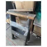 Two iron horse sawhorses