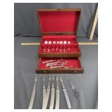 Silverware chest with flatware