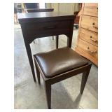 Singer sewing machine with cabinet stool and