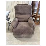 Recliner no rips or tears, but the armrest do