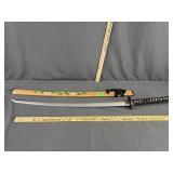 scabbard features a hand-painted pink flower