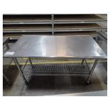 STAINLESS STEEL TABLE, 49"X24"X29", W/ CASTERS