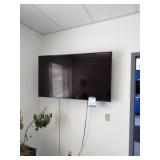 Wall-Mounted Flat Screen TV