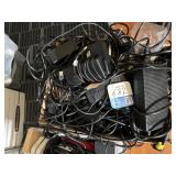 ASSORTED AC CHARGES AND DOCKING STATIONS. QTY: 25+