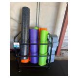 Holding and Organizing yoga mats and foam rollers