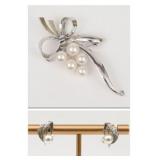 MIKIMOTO STERLING BOW PIN AND A PAIR OF EARRINGS