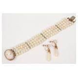 14K CORAL BRACELET AND A PAIR OF EARRINGS
