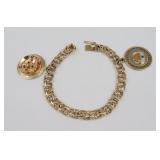 14K CHARM BRACELET AND (2) CHARMS