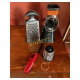 Asst Cheese Graters & Lighter