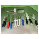 assorted knives, meat tenderizer, Etc.