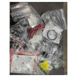Large box of drone repair parts and hardware