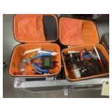 Two Turnigy cases with miscellaneous items inside