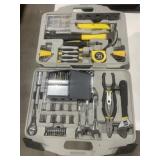 Black and yellow tools in carrying case